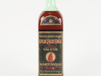 Vente aux enchères 1 BOUTEILLE GRAND RHUM DORÉ DUQUESNE 'VAL D'OR' 45° - 1943
