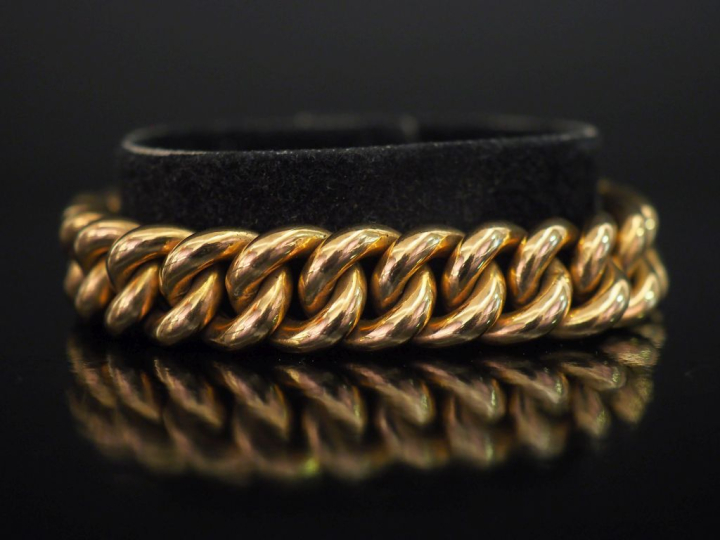 Bracelet souple en or jaune 750, maille gourmette.  Chainette de sécur