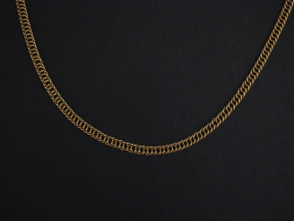Vente aux enchères Collier en or jaune 750, maille fantaisie.  Long. 69 cm Poids. 15,34 g