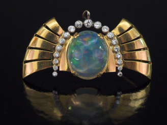 Vente aux enchères Broche porte-montre ajourée de style 1940 en or jaune 750 et platine 9