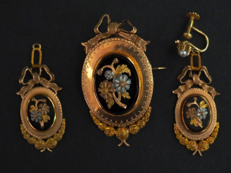 Vente aux enchères Demi-parure Napoléon III de style Louis XVI en or 750 trois tons et on