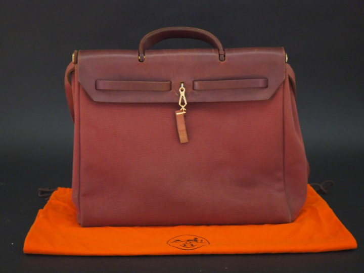 HERMES, Paris Sac porté main ou épaule en toile et cuir marron. Un poc