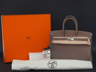 Vente aux enchères HERMES, Paris Sac Birkin, modèle "Etoupe" en cuir. Double poignée en c