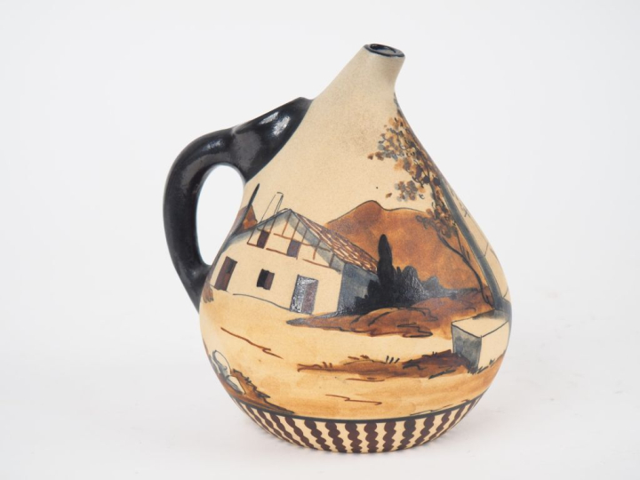 CIBOURE.  Pichet en céramique à décor de paysanne à la fontaine.  Sign