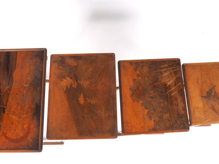 GALLE.  Suite de 4 tables gigognes en marqueterie , piétement de la pl