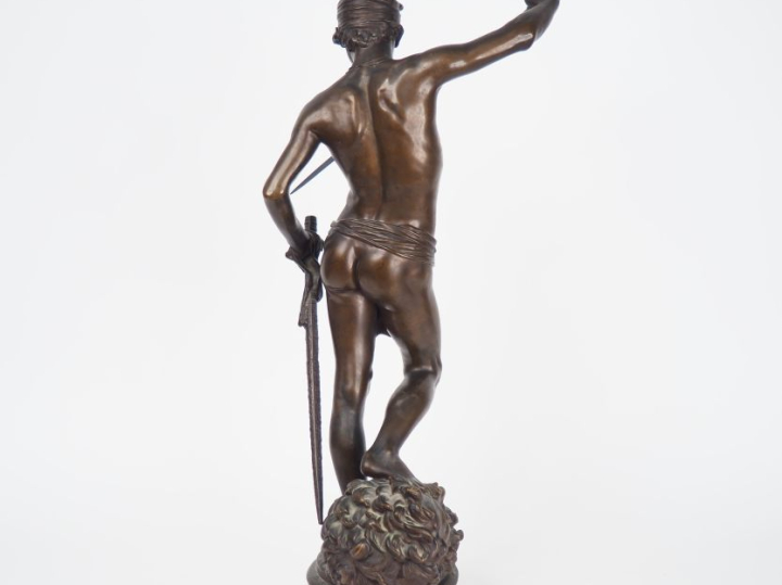 Antoinin MERCIER.  "David" Sculpture en bronze à patine brune. Signée,