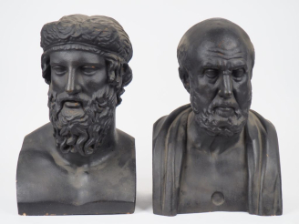 Vente aux enchères Paire de sculptures en plâtre patiné noir "portrait d'hommes à l'antiq