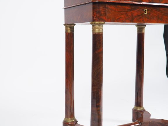 Travailleuse XIXème de style Empire en acajou et placage d'acajou flam