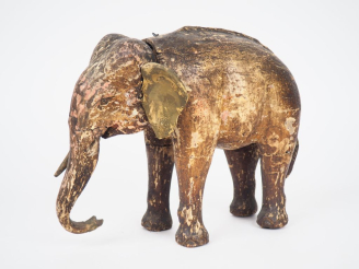 Vente aux enchères Sujet  en bois sculpté polychrome "Eléphant" (tête mobile)