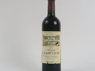 Vente aux enchères 1 BOUTEILLE CHÂTEAU LA LOUVIÈRE GC GRAVES - 1999 - EA