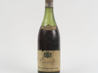 Vente aux enchères 1 BOUTEILLE TAVEL PAUL JABOULET AÎNÉ - 1946 - 7 CM/CAPS CORRODÉE