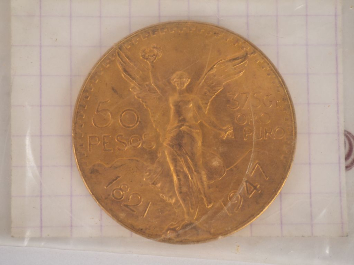 Une pièce de 50 Pesos or. FRAIS ACHETEURS 10% HT.   
