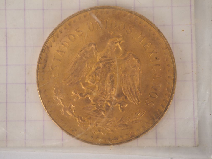 Une pièce de 50 Pesos or. FRAIS ACHETEURS 10% HT.   