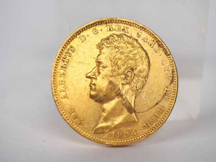 Une pièce de 100 Lires or, 1834.  FRAIS ACHETEURS 10% HT.   