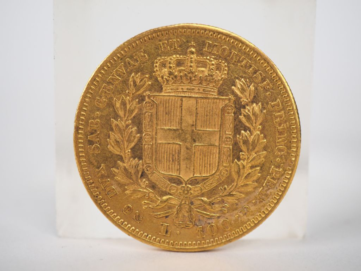 Une pièce de 100 Lires or, 1834.  FRAIS ACHETEURS 10% HT.   
