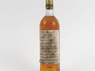 Vente aux enchères 1 BOUTEILLE CHÂTEAU RAYNE VIGNEAU 1er CC SAUTERNES - 1975 - BG/ET