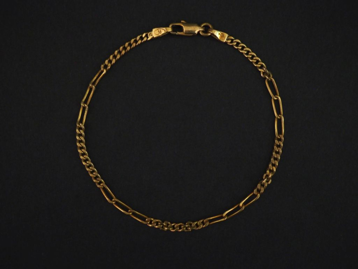 Bracelet souple en or jaune 750, maille fantaisie.  Long. 20,5 cm Poid