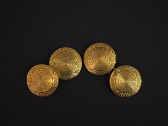 Vente aux enchères Paire de boutons de manchettes en or jaune 750, à décor de cercles con
