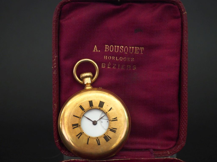 Montre de gousset en or jaune 750. Le couvercle orné de chiffres romai