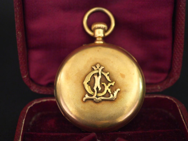 Montre de gousset en or jaune 750. Le couvercle orné de chiffres romai