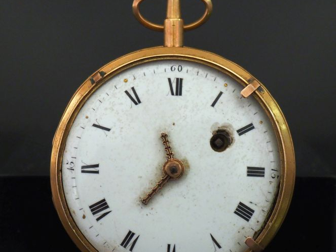 Montre de gousset XIXème en or jaune 750. Cadran émaillé à chiffres ro