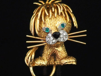 Vente aux enchères VAN CLEEF   ARPELS Broche en or jaune 750, "Lion ébouriffé". Les yeux 
