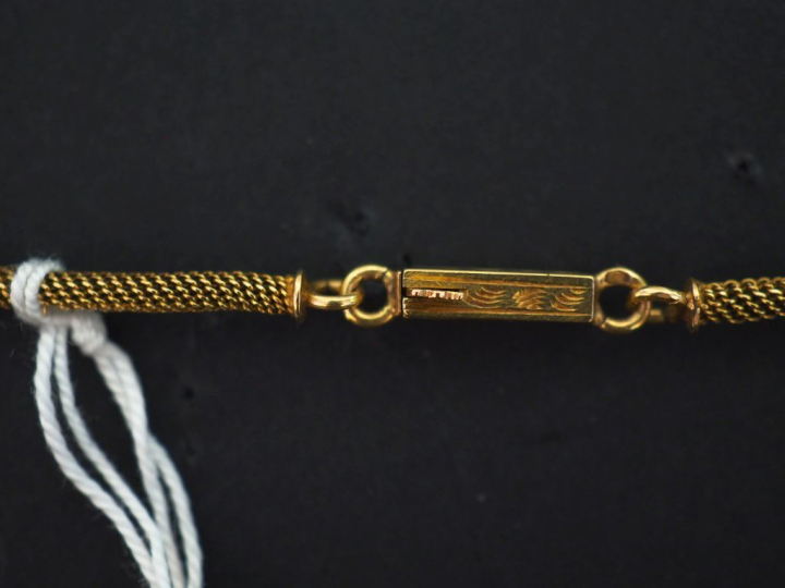 Collier Napoléon III en or jaune 750, maille dite "tubogaz", agrémenté