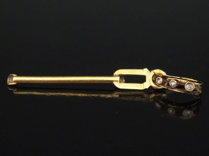 Elément de pendentif en or jaune 750, la bélière agrémentée d'un petit