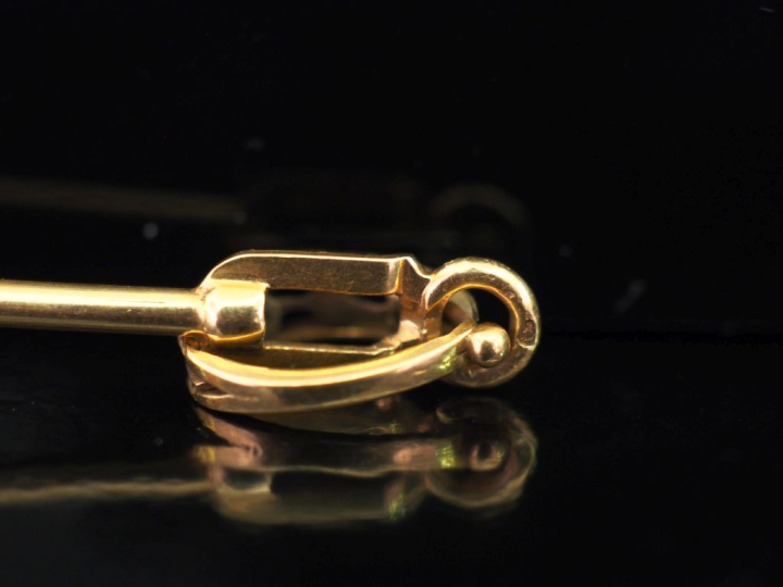 Elément de pendentif en or jaune 750, la bélière agrémentée d'un petit