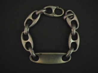 Vente aux enchères Gourmette en argent, maille marine. Long. 23 cm Poids. 68,27 g   