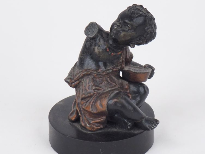 Sujet XIXème en plomb polychrome, "jeune nubien" sur un socle en bois 