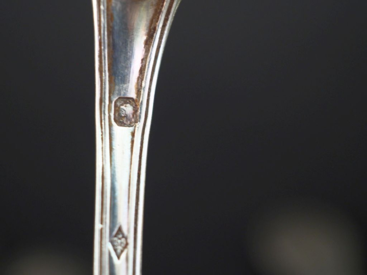 Ensemble comprenant :  - quatorze petites cuillères en argent 925, poi