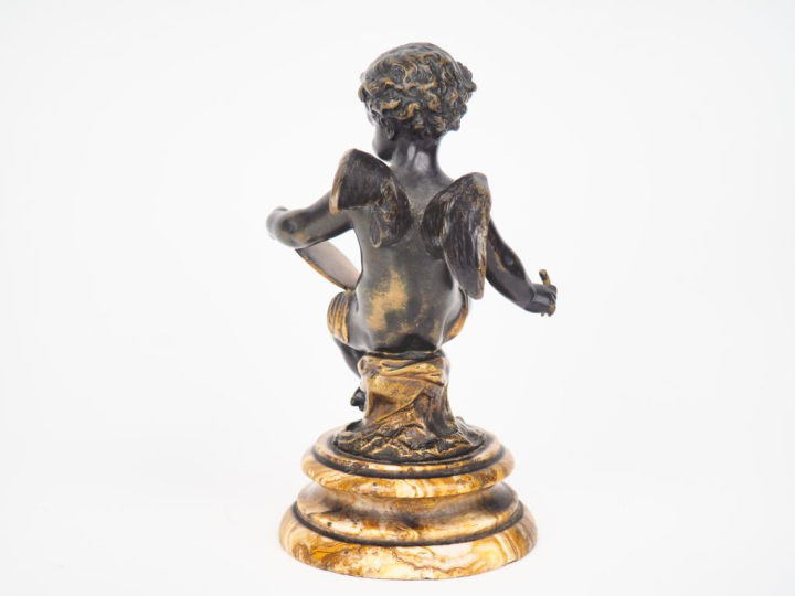 KLEY.  "amour" Sculpture en bronze patiné et doré, sur un socle en ony