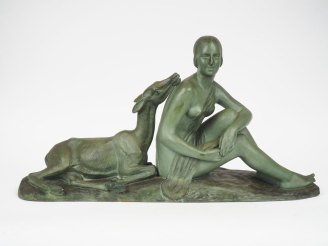 Vente aux enchères RIGAUD.  "Jeune femme à la biche" Groupe en terre cuite à patine verte