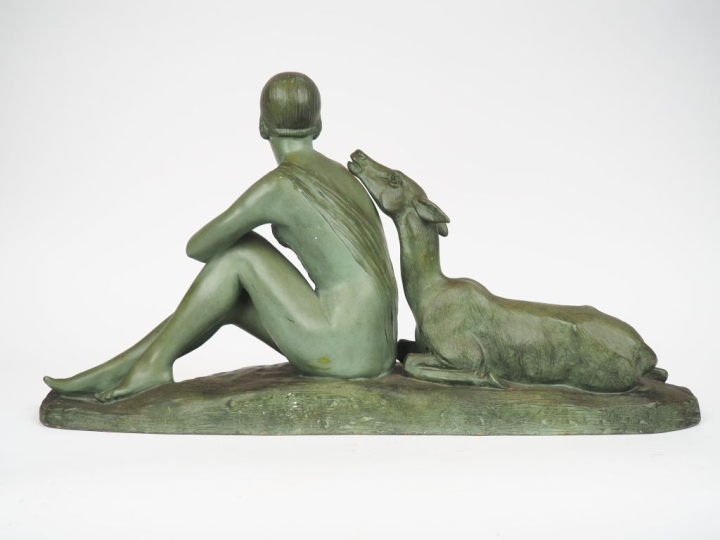 RIGAUD.  "Jeune femme à la biche" Groupe en terre cuite à patine verte