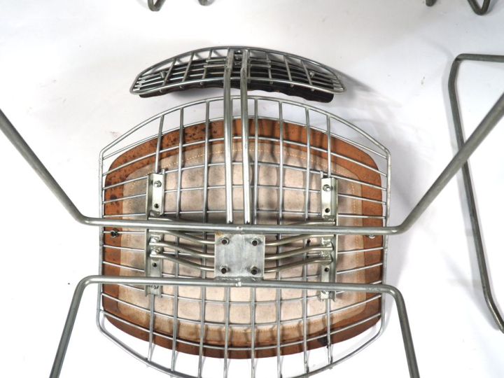 Michel CADESTIN. Suite de six chaises modèle "traineau", structure de 