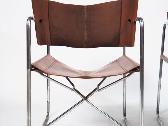 Michel CADESTIN. Paire de fauteuils modèle "Président", structure repl