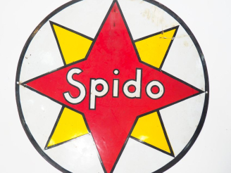 Vente aux enchères SPIDO.  Plaque émaillée. Diam. 59 cm. (accidents)