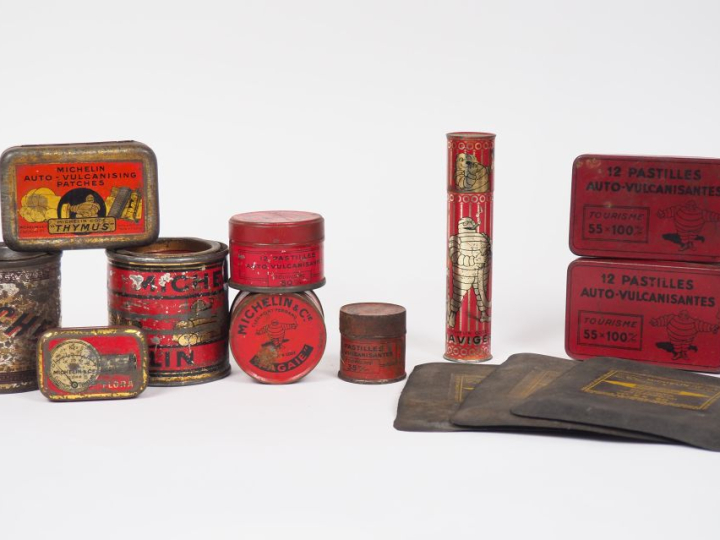 MICHELIN.  Lot de 9 boîtes et un couvercle en tôle lithographiée, on y