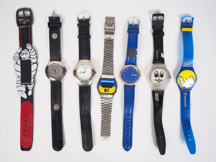 MICHELIN.  Lot 6 montres Bibendum et un bracelet.