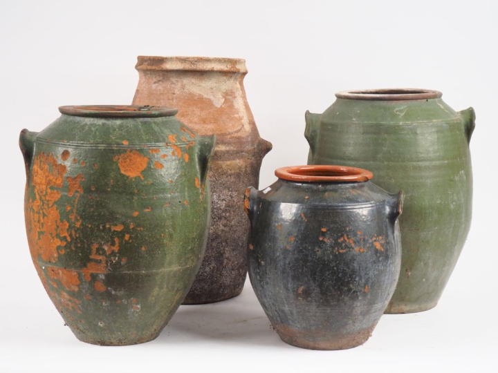 4 pots en terre vernissée.