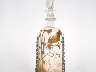 Vente aux enchères Flacon 1900 en cristal émaillé à décor doré d'oiseaux et de bambous.