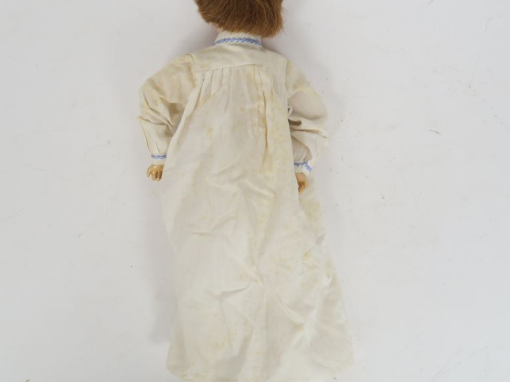 	Masson poupée à tête porcelaine marquée Lorraine 0 les yeux sont en i