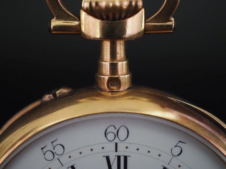 Montre de gousset en or jaune 750.  Cadran à chiffres romains pour les
