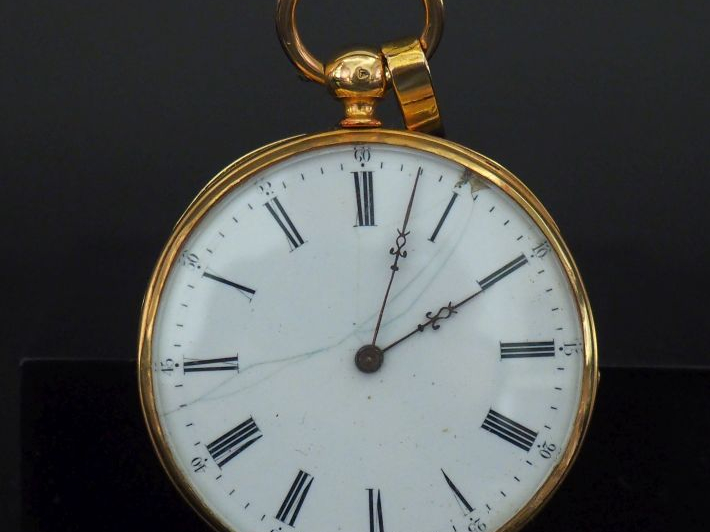 Montre de gousset en or jaune 750.  Cadran émaillé à chiffres romains 