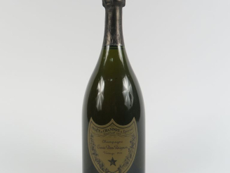 Vente aux enchères 1 BOUTEILLE CHAMPAGNE DOM PÉRIGNON - 1976 - COFFRET