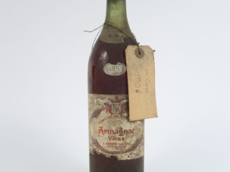 Vente aux enchères 1 BOUTEILLE ARMAGNAC VIEUX DOMAINE DE SÉGURET - 1910 - BS/EA/PORTE UNE