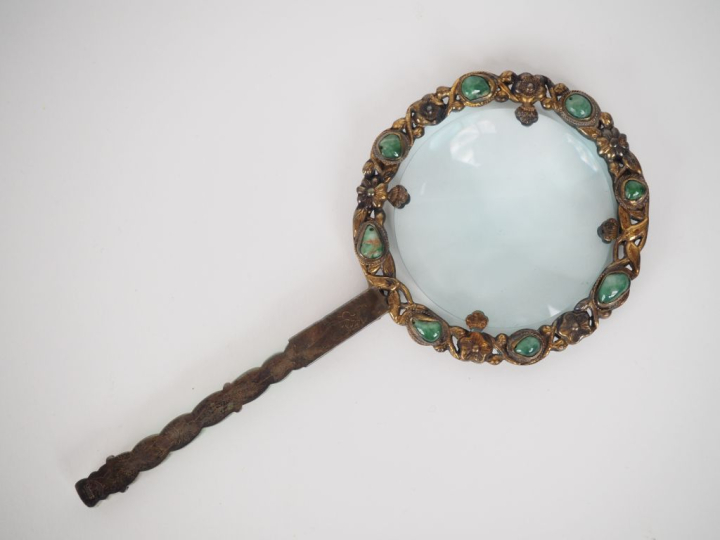 Chine, XXe siècle,  Loupe montée sur argent, le manche tressé en jadéi