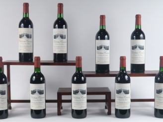 Vente aux enchères 9 BOUTEILLES CHÂTEAU CANON 1er GCC ST ÉMILION - 1987 - CBO - BG
