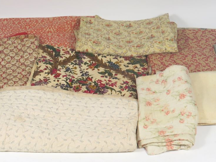 8 différents boutis.